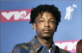  ?? PHOTO BY EVAN AGOSTINI — THE ASSOCIATED PRESS ?? In this file photo, 21 Savage poses in the press room at the MTV Video Music Awards at Radio City Music Hall in New York.