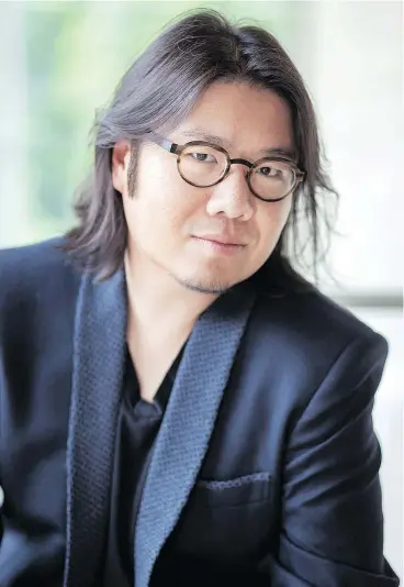  ??  ?? Kevin Kwan, author of the Crazy Rich Asians trilogy, took time out of his whirlwind schedule to speak with Postmedia about the upcoming film adaptation of his novel.