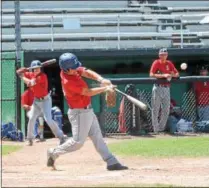  ?? JOHN BREWER - ONEIDA DAILY DISPATCH ?? Post 230utility man Tyler Rotach singles during the bottom of the fourth inning in a 4-0shutout against Helmuth-Ingalls.