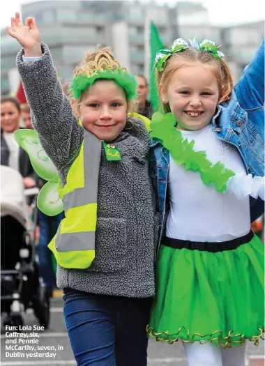  ??  ?? Fun: Lola Sue Caffrey, six, and Pennie McCarthy, seven, in Dublin yesterday