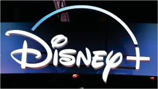  ?? AFP PHOTO ?? HIGH EARNINGS
A Disney+ streaming service sign is pictured at the D23 Expo on Aug. 23, 2019 at the Anaheim Convention Center in Anaheim, California. Disney on Wednesday, Feb. 7, 2024, announced it posted higher-than-expected profit in the last three months of 2023.