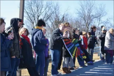  ?? MARIAN DENNIS — MEDIANEWS GROUP ?? A line of supporters formed along the entrance to the Exeter Community Library Saturday as Drag Queen Story Hour started.