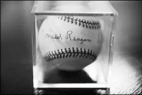  ?? GEORGE ETHEREDGE / THE NEW YORK TIMES ?? A baseball signed by former President Ronald Reagan and former Soviet leader Mikhail Gorbachev is in Shanus’ collection.