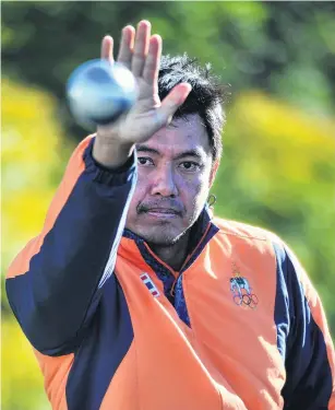  ?? PHOTO: CHRISTINE O’CONNOR ?? Simple but stable . . . Kant Petchaboon throws a ball during a break in a coaching clinic he held at the Dunedin City Petanque Club yesterday.