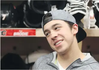  ?? CHRISTINA RYAN/ CALGARY HERALD ?? Calgary Flames rookie Johnny Gaudreau, speaking to the media at the Scotiabank Saddledome on Wednesday, said it’s exciting to be part of a playoff drive as a young player.