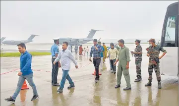  ?? HT FILE ?? Passengers disembark from Indian Air Force's C17 Globemaste­r at Hindon Air Force Station after being evacuated from Kabul amid the Taliban takeover crisis in Ghaziabad on August 21.