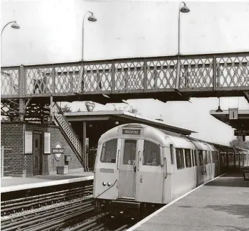  ??  ?? The Central Line's Woodford to Hainault shuttle was operated as a testbed for Automatic Train Operation (ATO) from April 1964 – and here 1960 Stock fitted with experiment­al ATO equipment is on test at Roding Valley.
London Transport Museum
