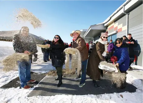  ?? JIM WELLS ?? Tsuut’ina Nation Chief Lee Crowchild, centre, along with political representa­tives and school board officials, takes part in a sod-turning ceremony on Wednesday to mark the beginning of constructi­on of a new area high school. The federally funded school is expected to open in fall 2020.