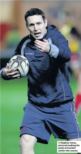  ??  ?? > Stephen Jones, pictured making his point at Scarlets earlier this season