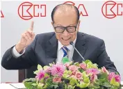  ??  ?? Li Ka-shing gestures during a press conference in Hong Kong yesterday.