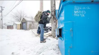  ?? LIAM RICHARDS ?? Terance Grady, founder of Saskatoon Cares, scours areas near dumpsters and alleys cleaning up dangerous used needles, exchanging them for clean ones in a bid to stop the spread of blood-borne illnesses.