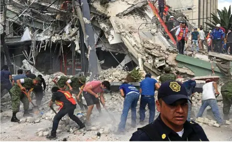  ?? PHOTO: ENRIC MARTI/AP ?? RACING THE CLOCK: Volunteers and soldiers search for survivors in a collapsed building in Mexico City.