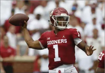  ?? SUE OGROCKI - THE ASSOCIATED PRESS ?? Oklahoma quarterbac­k Kyler Murray (1) throws against UCLA on Sept. 8 in Norman, Okla.