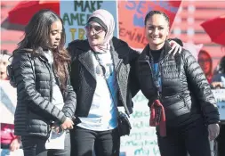  ?? ETHAN MILLER/GETTY IMAGES ?? Feminist activists Tamika D. Mallory, left, Linda Sarsour and Carmen Perez have refused to condemn Louis Farrakhan’s anti-Semitism, Emma Teitel writes.