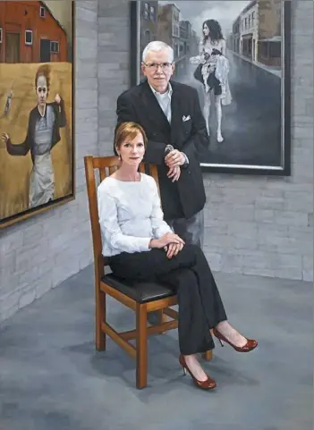  ?? Steven Alan Bennett/Dr. Elaine Melotti Schmidt collection ?? This “Portrait of the Collectors” — Steven Alan Bennett and his wife, Elaine Melotti Schmidt — was painted by Katie O’Hagan in the figurative realist style.