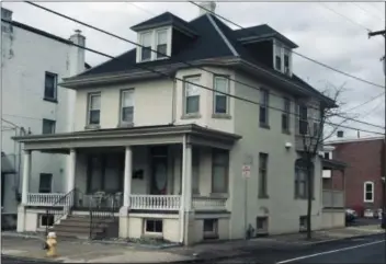  ?? PHOTO BY MICHAEL SNYDER ?? This house at the northwest corner of High and York streets was known in Pottstown for years as the “Fronheiser­er House.” Wilfred Fronheiser inherited the home from his father, Samuel. By 1920 he and his second wife, Daisy Bell Seymour lived there. Despite a name that could have come from “L’il Abner,” Daisy was a Washington, D.C., socialite. At some point after Wilfred’s death she returned to her former stomping grounds and probably died there in 1956. However she is buried alongside her husband in the western section of the Pottstown Cemetery.