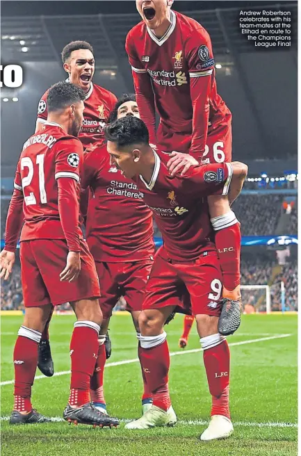  ??  ?? Andrew Robertson celebrates with his team-mates at the Etihad en route to the Champions
League Final
