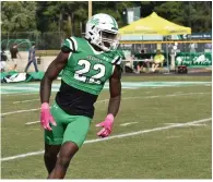  ?? Commercial/I.C. Murrell) (Pine Bluff ?? UAM defensive back Demauryon Holmes hustles off the field on a change of downs in an Oct. 21 game against Henderson State.