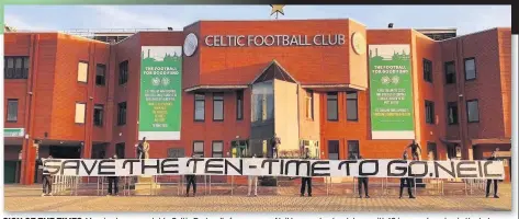  ??  ?? SIGN OF THE TIMES
Massive banner outside Celtic Park calls for manager Neil Lennon to stand down with 10 in a row hanging in the balance