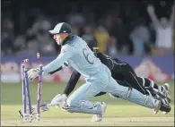  ?? PICTURE: NICK POTTS/PA. ?? AUTHENTIC: Jos Buttler runs out New Zealand’s Martin Guptill to win the World Cup for England at Lord’s last summer.