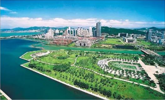  ?? PROVIDED TO CHINA DAILY ?? The artistic image of Bailuzhou in Xiamen, Fujian province, shows the rise of the city as a regional financial center.
