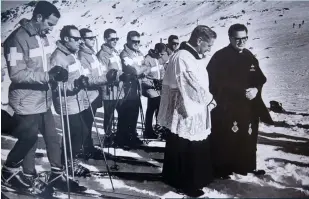  ??  ?? Blessing of the Thredbo Ski Patrol in the early 1960s. Tommy Tomasi is second from the left.