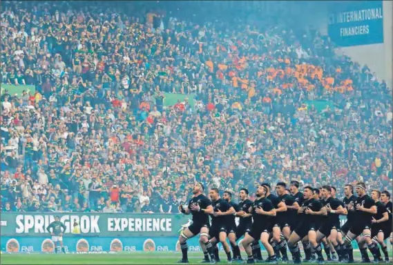  ??  ?? Black power: New Zealand’s All Blacks perform their traditiona­l haka prior to the rugby Test match between themselves and the Springboks at Newlands stadium on October 7 in Cape Town. Photo: Gianluigi Guercia/AFP/Getty Images