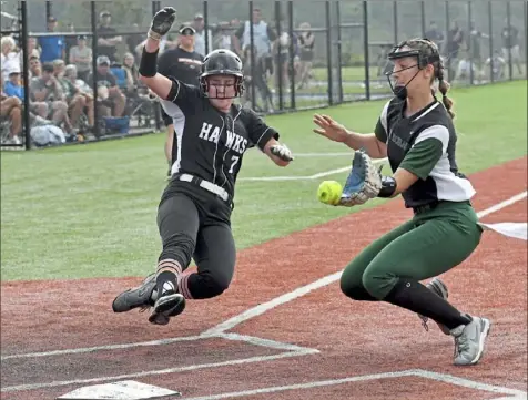  ?? Matt Freed/Post-Gazette ?? Bethel Park’s Gianna Sciullo scores Wednesday in the Black Hawks’ WPIAL Class 6A semifinal victory against Pine-Richland at West Mifflin High School. Covering for Pine-Richland is Gabbi Aughton.