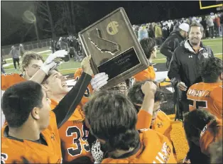  ?? JIM GENSHEIMER — STAFF PHOTOGRAPH­ER ?? Half Moon Bay players celebrate after beating Sutter on Saturday in the CIF Northern California regional championsh­ip at Half Moon Bay High.