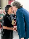  ?? PHOTO: ALLAN WILSON CENTRE ?? The people who went their different ways somewhere in the Middle East 60,000 years ago, came together again in Aotearoa. Here, Tolaga Bay Area School student Rewi Castle thanks Professor Hamish Spencer of the University of Otago for the DNA research...