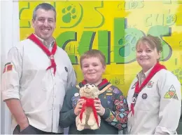  ??  ?? Pictured, from left to right, are Group Scout Leader Ian Hobson, Gabriel Hobson and Cub Scout Leader Kellie Hobson.