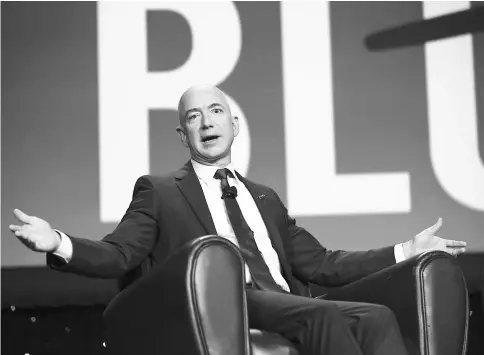  ??  ?? Amazon.com CEO Bezos speaks during the 32nd Space Symposium in Colorado Springs, Colorado, on Apr 12, 2016. — WP-Bloomberg photo