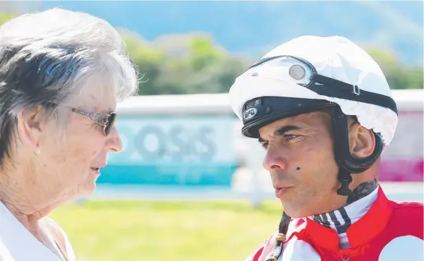  ?? Picture: BRENDAN RADKE ?? POST MORTEM: Fine 'n' Devine owner and trainer Rhonda Inglis speaks with jockey Wanderson D'Avila after the three-year-old filly won yesterday.