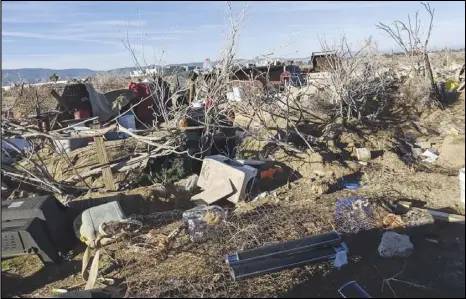  ?? JULIE DRAKE/VALLEY PRESS FILES ?? A homeless camp off Sierra Highway and Avenue L in Lancaster is reinforced with a block wall last year. The city has asked to have input on a system that connects homeless people with housing and other services.