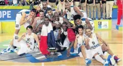  ?? EPA ?? France players celebrate after their team’s victory against Lithuania.