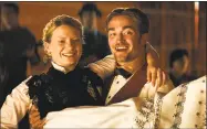  ?? Associated Press ?? Mia Wasikowska, left, and Robert Pattinson in a scene from “Damsel.”