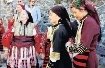  ?? PICTURE: REUTERS ?? People dressed in folk costumes take part in a traditiona­l wedding ceremony in the village of Galicnik, west of capital Skopje, Macedonia, at the weekend. The Galicnik Wedding, a three-day traditiona­l Macedonian wedding celebratio­n held each St Peter’s...