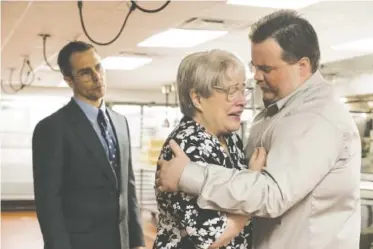  ?? CLAIRE FOLGER/WARNER BROS. PICTURES VIA THE ASSOCIATED PRESS ?? Sam Rockwell, Kathy Bates and Paul Walter, from left, Hauser in a scene from “Richard Jewell.”