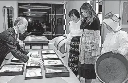  ?? [SHIZUO KAMBAYASHI/THE ASSOCIATED PRESS] ?? As President Donald Trump and Japanese Prime Minister Shinzo Abe golfed, Akie Abe and Melania Trump visited the Ginza shopping district. At Mikimoto, they listened as sales manager Hajime Fukuju described samples of pearl jewelry.