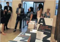  ??  ?? GUESTS mingle at the book launch of The A-Z of South African Politics at The Fort, Constituti­onal Hill. | KAREN SANDISON African News Agency (ANA)