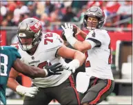  ?? Dirk Shadd / TNS ?? Buccaneers quarterbac­k Tom Brady prepares to pass against the Eagles on Sunday in Tampa, Fla.