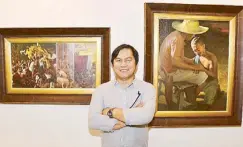  ??  ?? Cebuano artist Jun Impas and his “Panata” and “Prodigal Son” paintings. Impas is known for his portraits, many of which are commission­ed works.