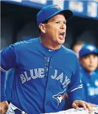  ?? JULIO AGUILAR GETTY IMAGES FILE PHOTO ?? Blue Jays manager Charlie Montoyo has mixed and matched and kept bench players involved at every stop of his baseball career. Those skills will be put to the test this summer.