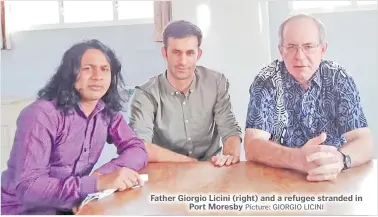  ?? Picture: GIORGIO LICINI ?? Father Giorgio Licini (right) and a refugee stranded in
Port Moresby