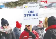  ?? JOHN LAPPA / POSTMEDIA NEWS FILES ?? Teachers and staff represente­d by the Ontario Secondary School Teachers’ Federation took part in a one-day strike in Sudbury on Feb. 28. just a few weeks before lockdown.