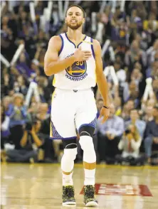  ??  ?? Warriors guard Stephen Curry, reacting after a three-pointer in the third quarter, scored 28 points in 30 minutes of play.