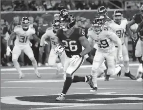  ?? AP/DAVID J. PHILLIP ?? Houston Texans running back Lamar Miller (26) rushed for 162 yards, including a 97-yard touchdown run, in the Texans’ 34-17 victory over the Tennessee Titans on Monday night. As a team, the Texans rushed for 281 yards.