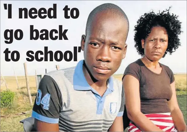  ?? Picture: LULAMILE FENI ?? SO UNFAIR: Sive Joyi, 16, and his mother Khayakazi are distraught as he is allegedly being blocked from transferri­ng to a new school after losing his sight in 2015 following a teacher’s assault