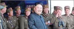  ?? MANAN VATSYAYANA/AFP ?? North Korean leader Kim Jong-un (centre) has yet to visit China after being in power for over five years.