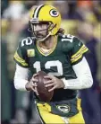  ?? AP file photo ?? Aaron Rodgers wasn’t as sharp as usual last week in a 17-0 win over Seattle. He went 23 of 37 for 292 yards with no touchdown passes and one intercepti­on, and the Packers didn’t score a TD until the fourth quarter.